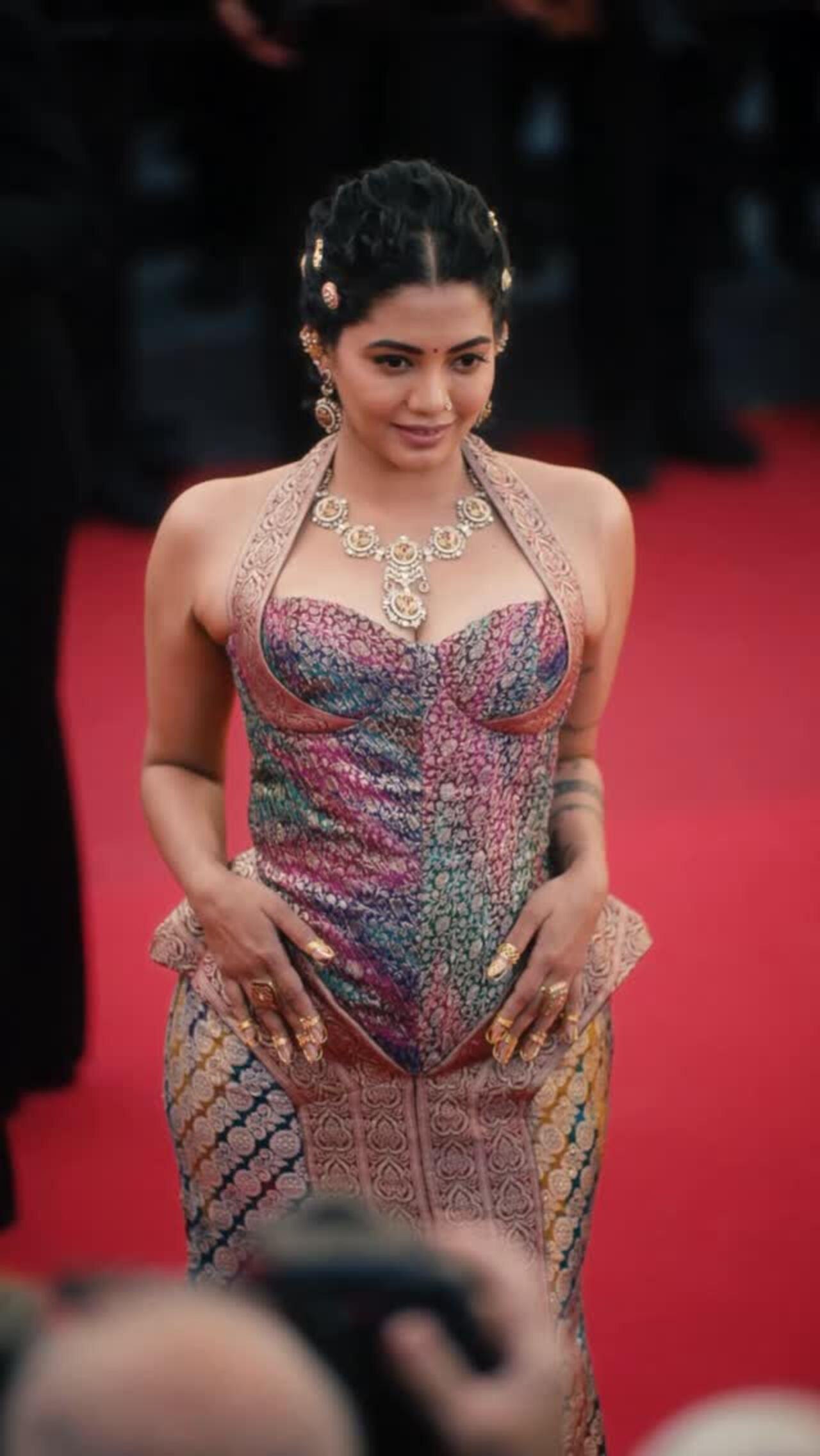 Disha Madan
The creator was seen wearing two 80-year-old vintage sarees, fused into a single silhouette.. a tribute to preserving Indian textiles by reimagining heirloom fabrics, rather than destroying them for their zari.